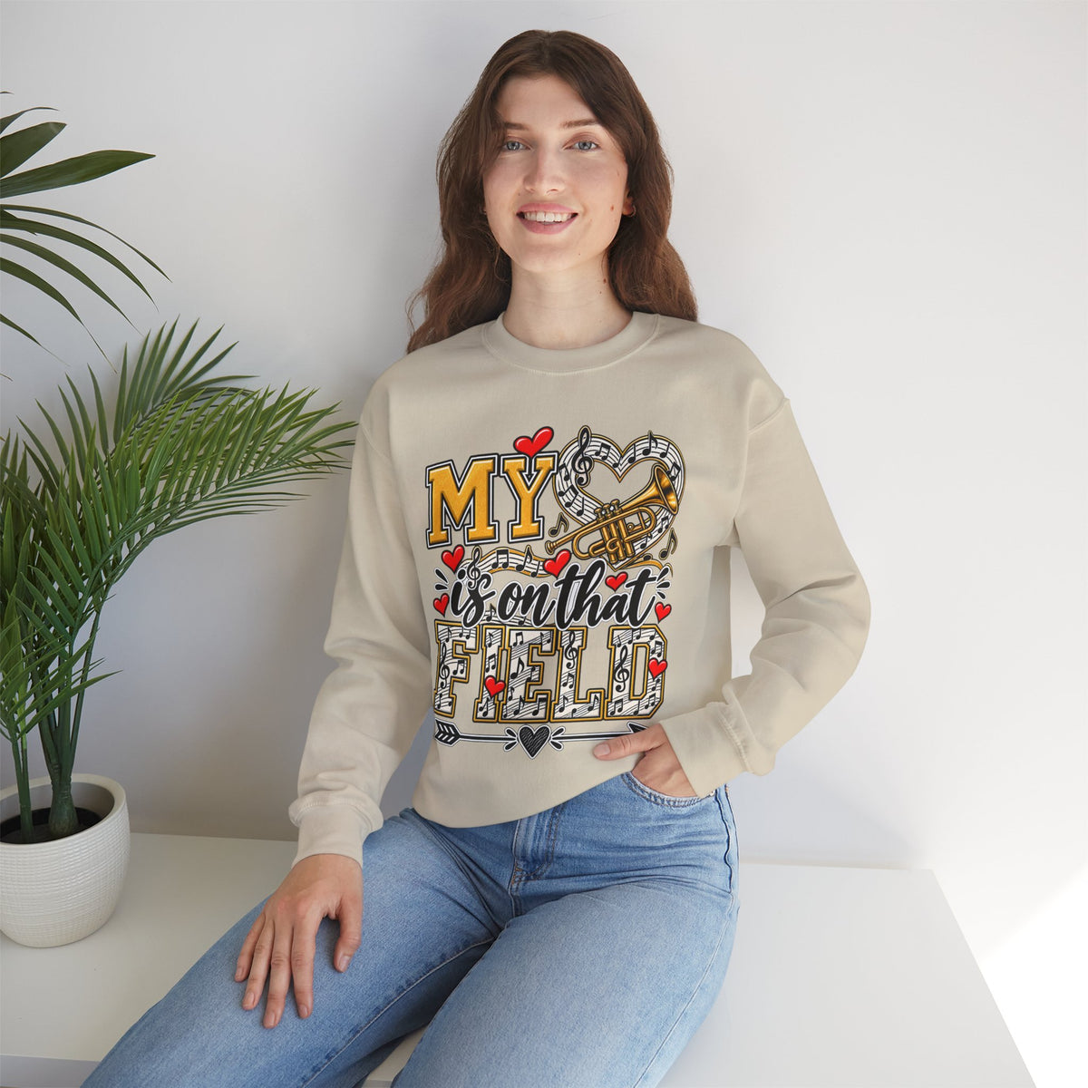 Sand sweatshirt front graphic with “My” lettering, trumpet image, and hearts