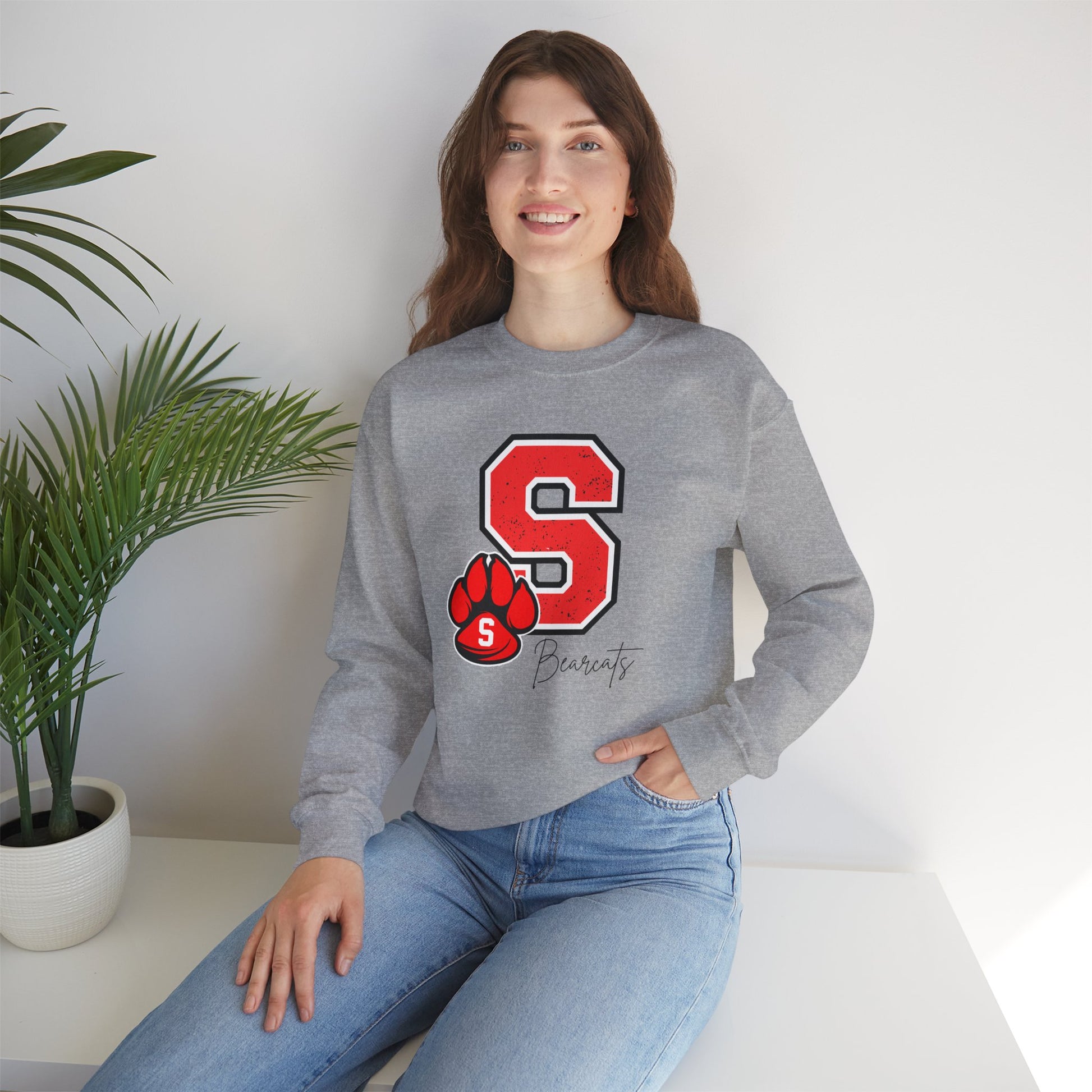 Heather gray crewneck sweatshirt featuring red varsity S with paw print graphic on chest