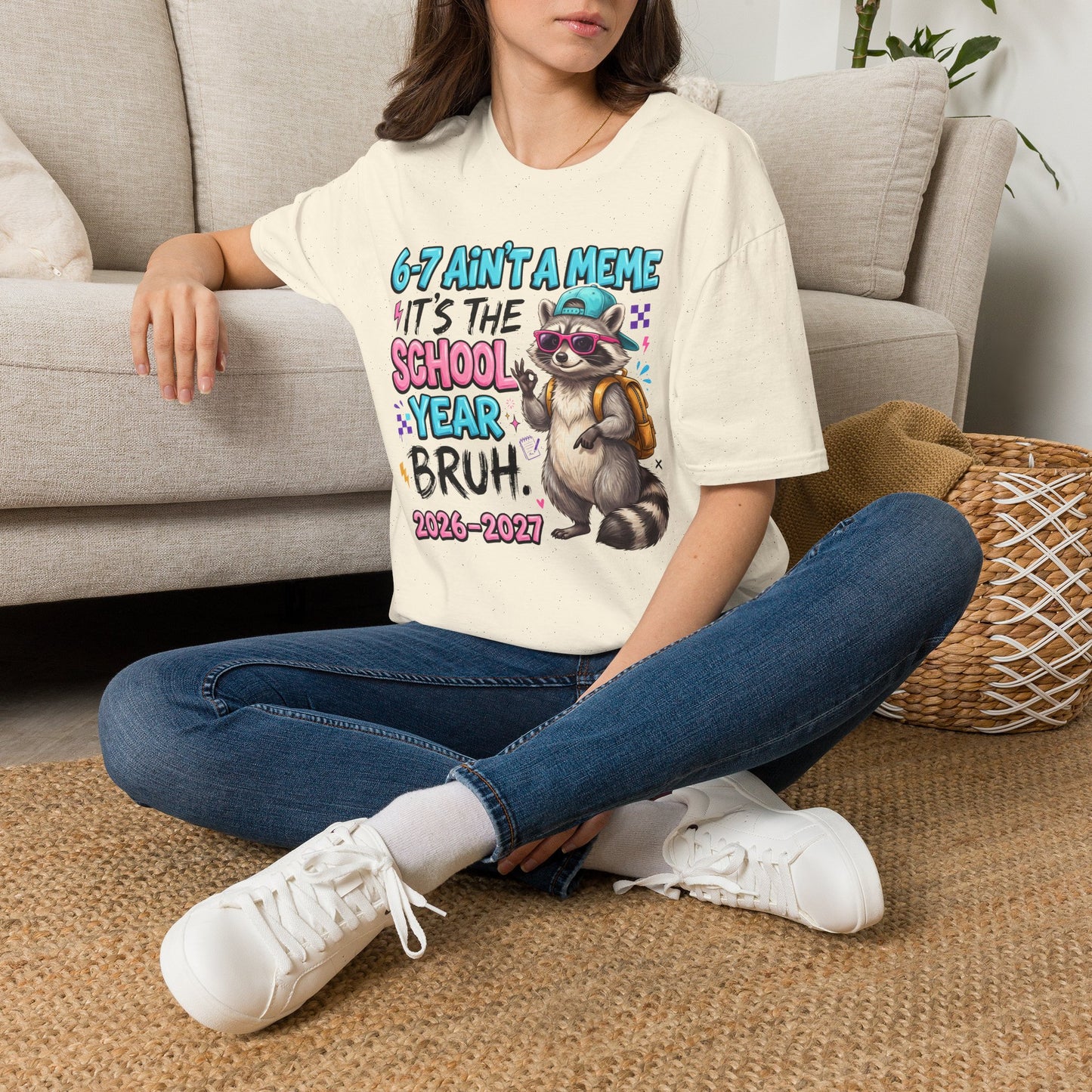 White crewneck T-shirt with raccoon school year graphic worn by model