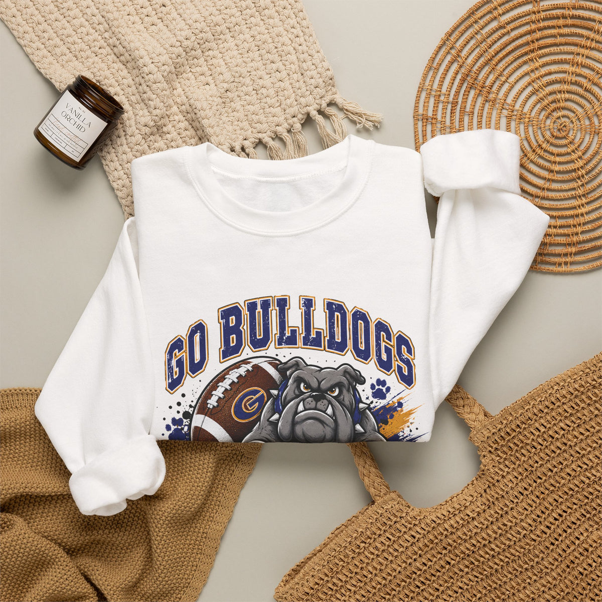White crewneck sweatshirt folded view, front Bulldogs Gering football graphic