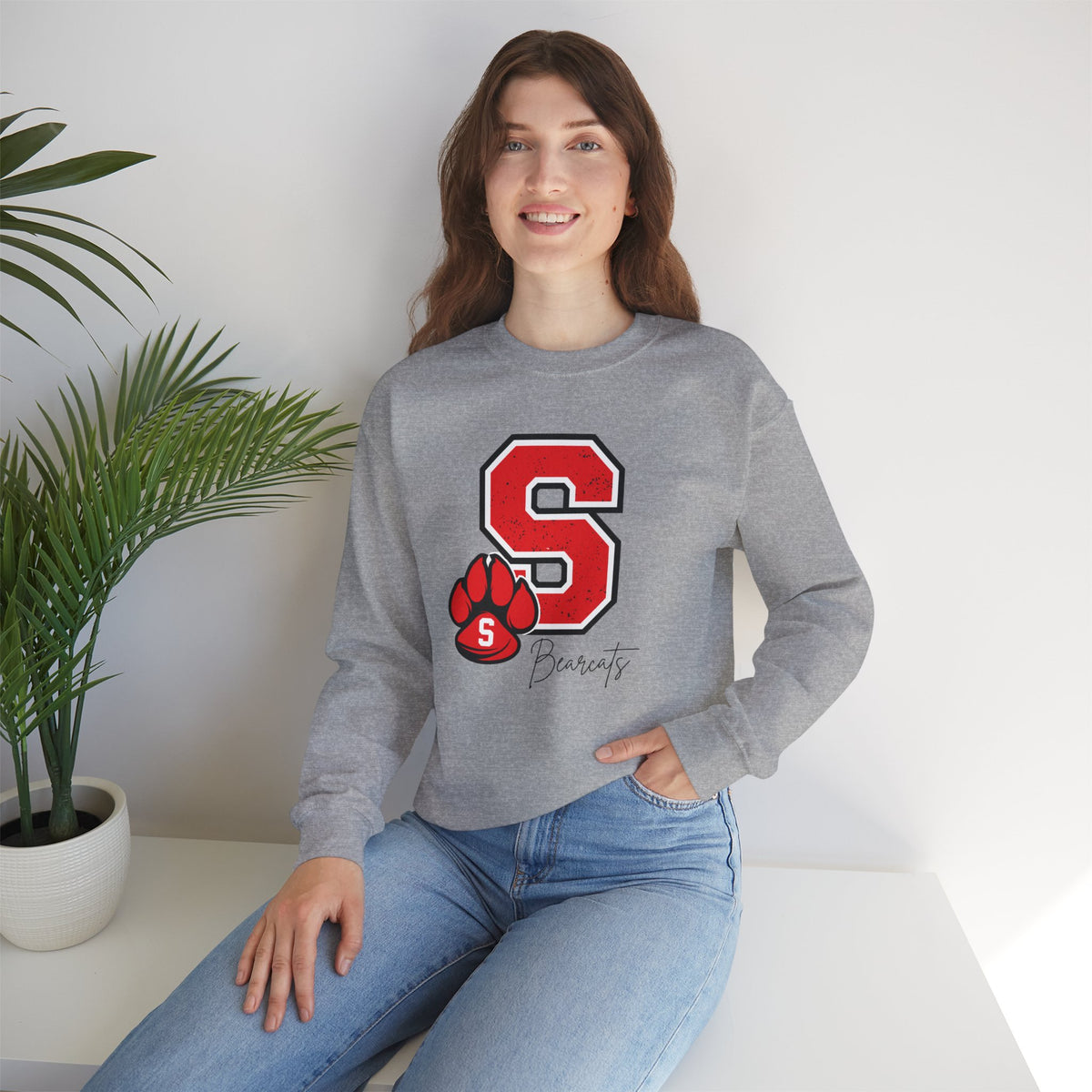 Sport grey crewneck sweatshirt featuring red S and paw graphic on front