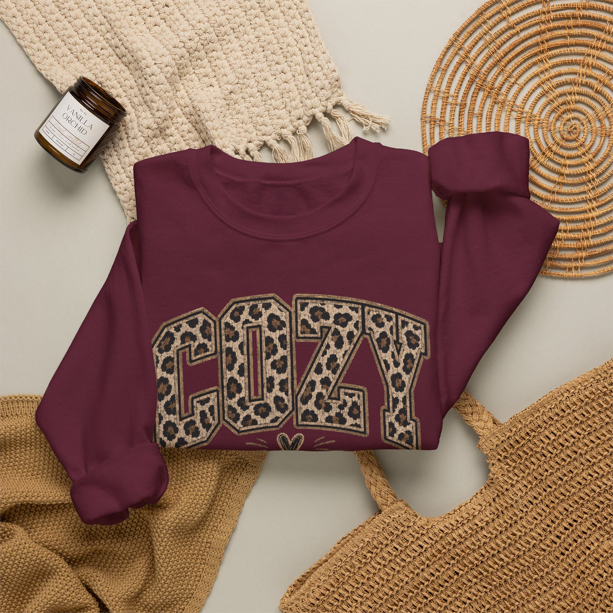 Maroon leopard graphic crewneck sweatshirt with ribbed cuffs and crew neckline