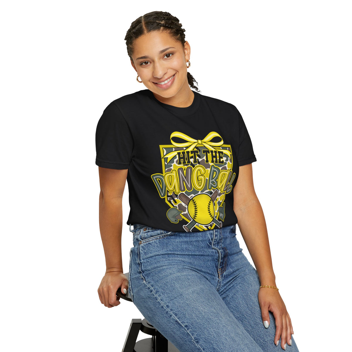 Black softball graphic tee on model with yellow bow and baseball 'Hit the Dang Ball' design