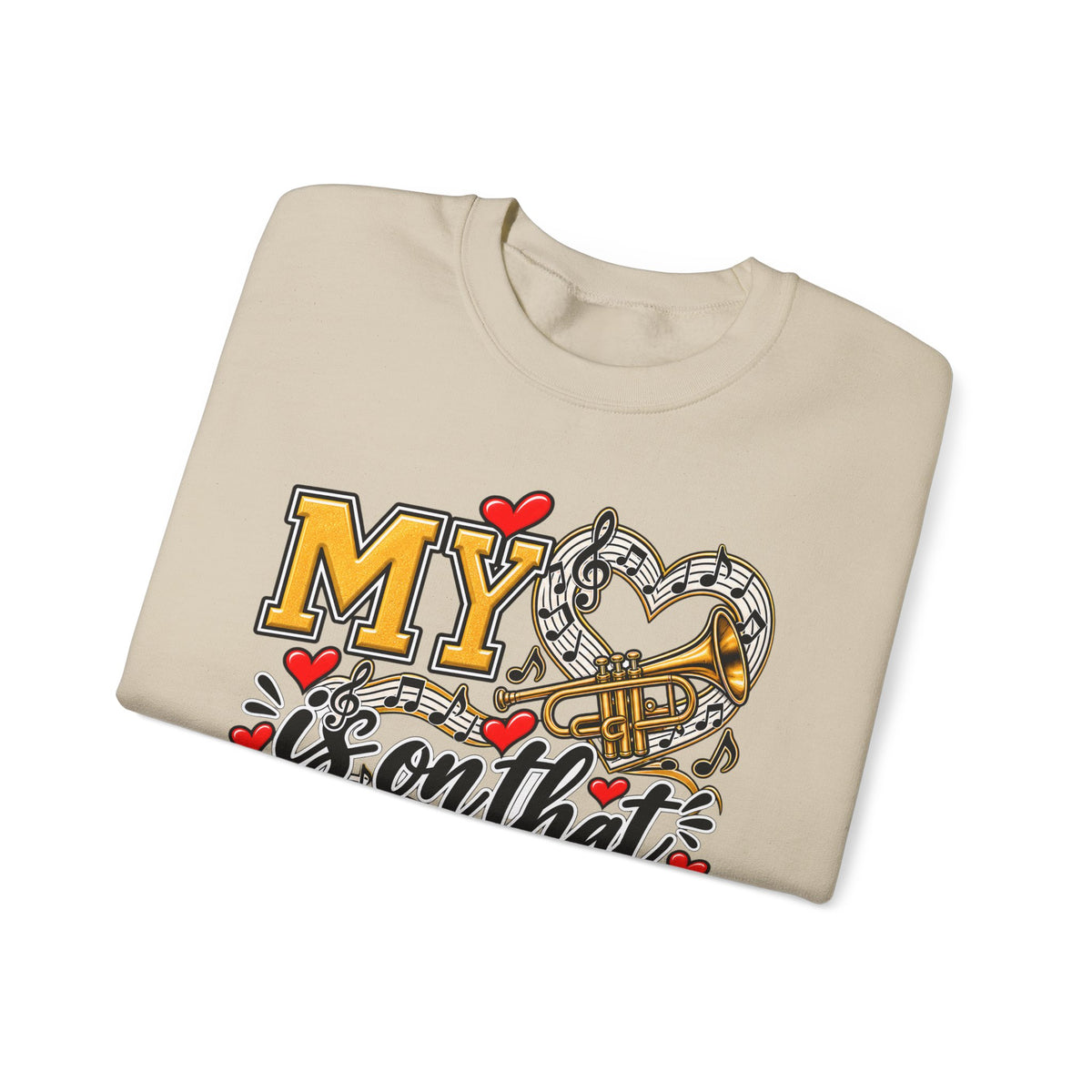 Sand sweatshirt folded showing heart and trumpet marching-band graphic