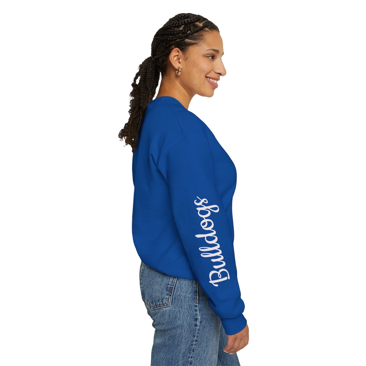 Royal blue crewneck sweatshirt, side view, with white “Bulldogs” text on the sleeve