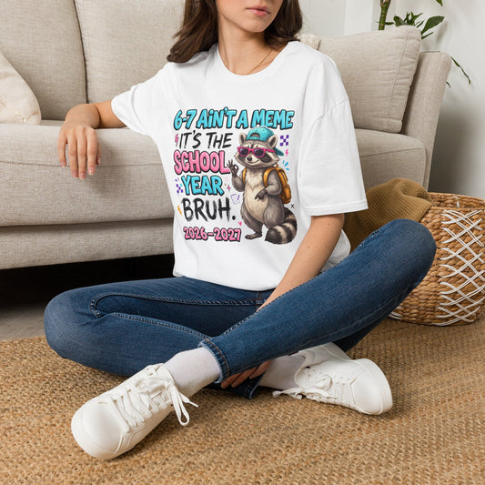 White raccoon back-to-school T-shirt with front school-year graphic and text