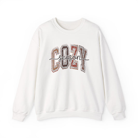 White crewneck sweatshirt with Cozy Season graphic front