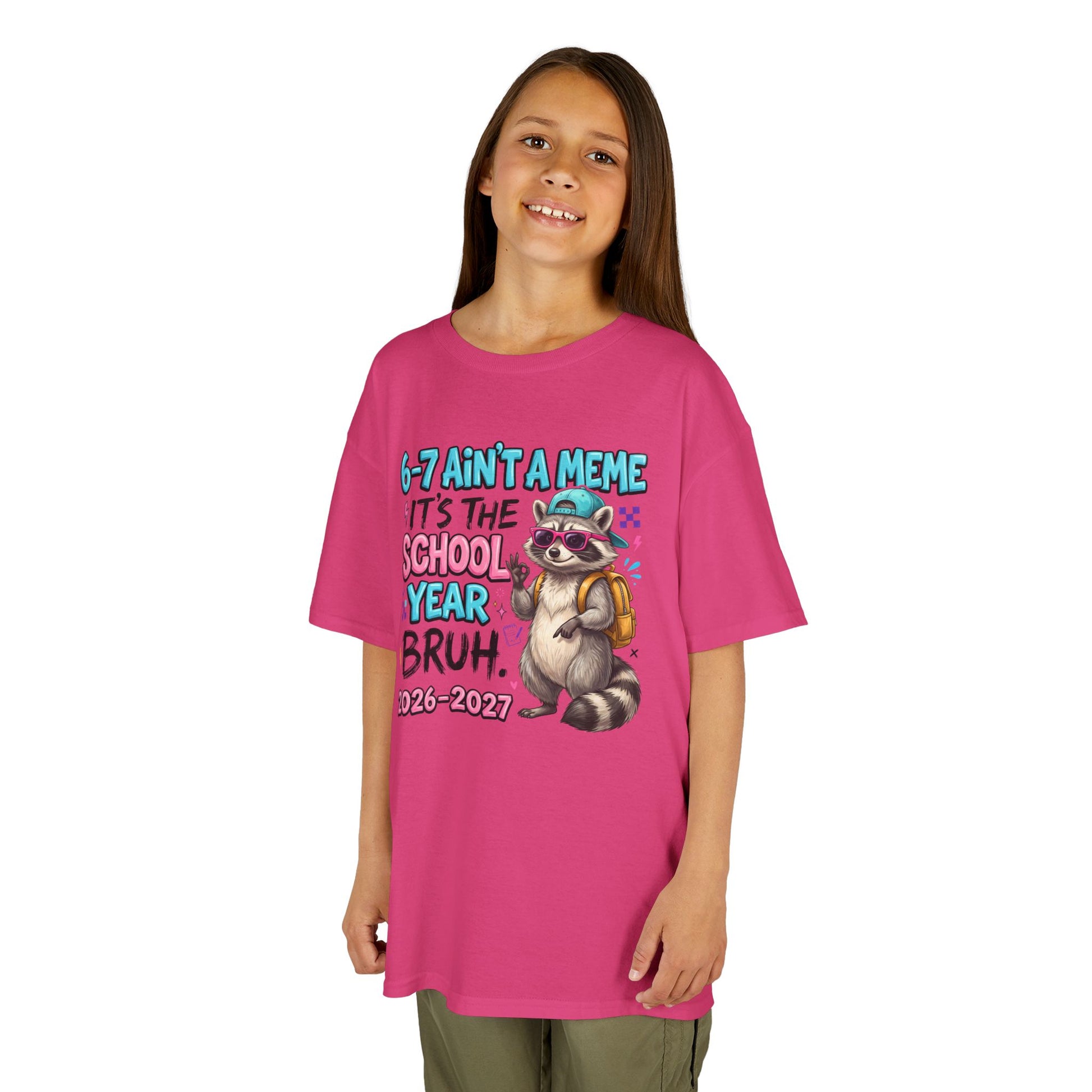 Hot pink kids graphic T-shirt with raccoon backpack meme print, worn by child