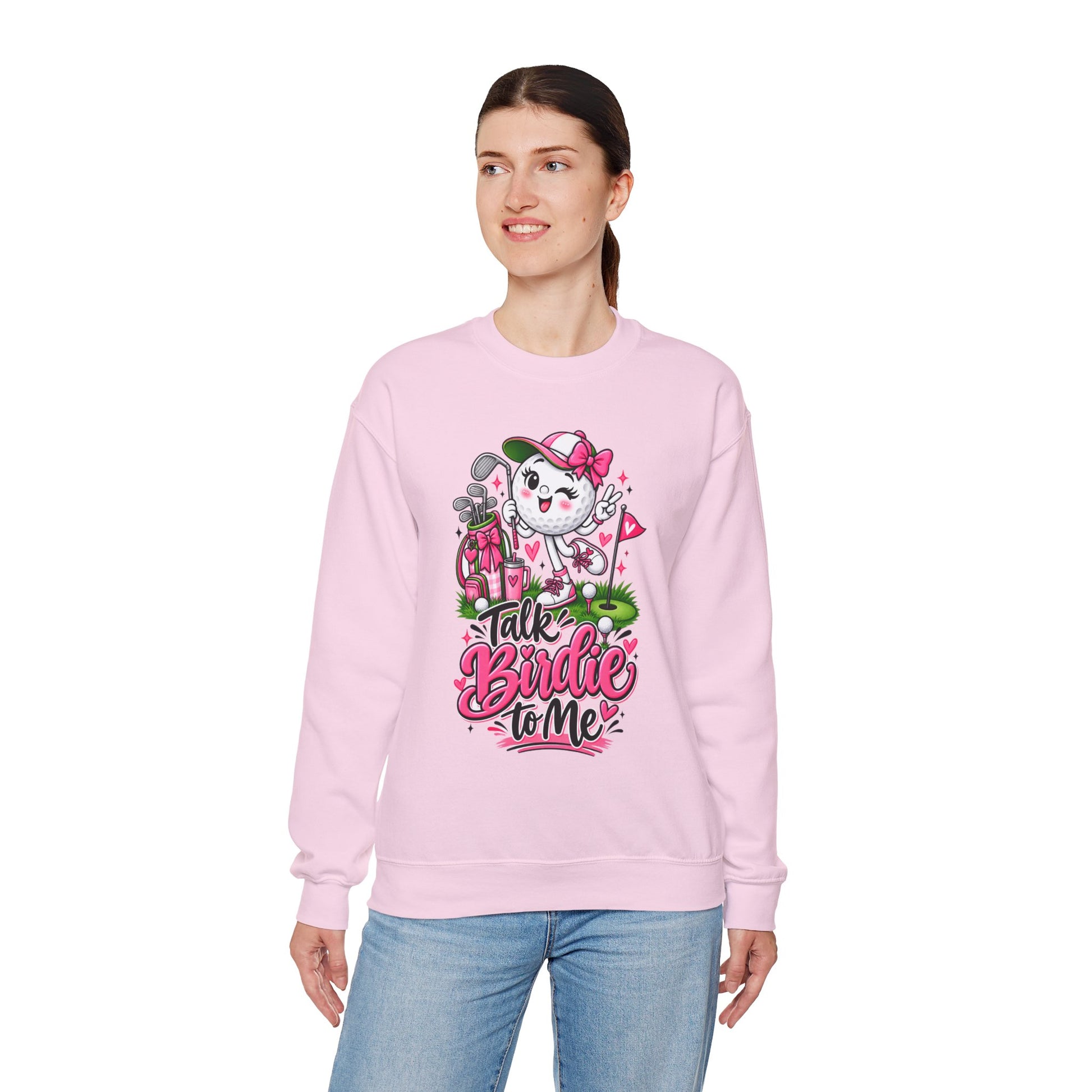 Pink crewneck sweatshirt with centered golf-ball character graphic on front