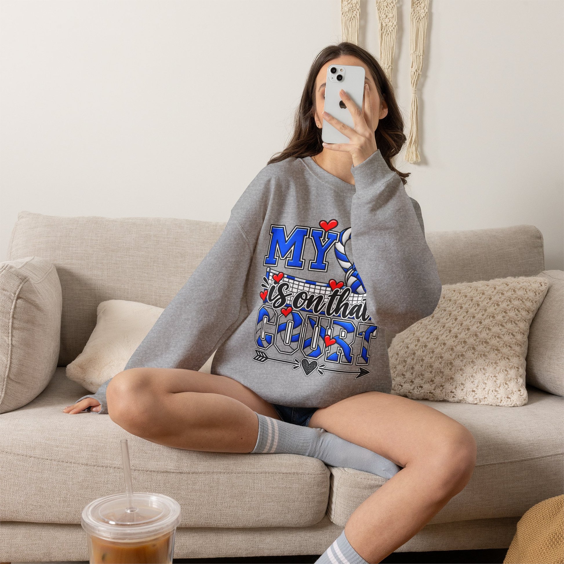 Sport grey crewneck sweatshirt with front volleyball heart graphic and long sleeves