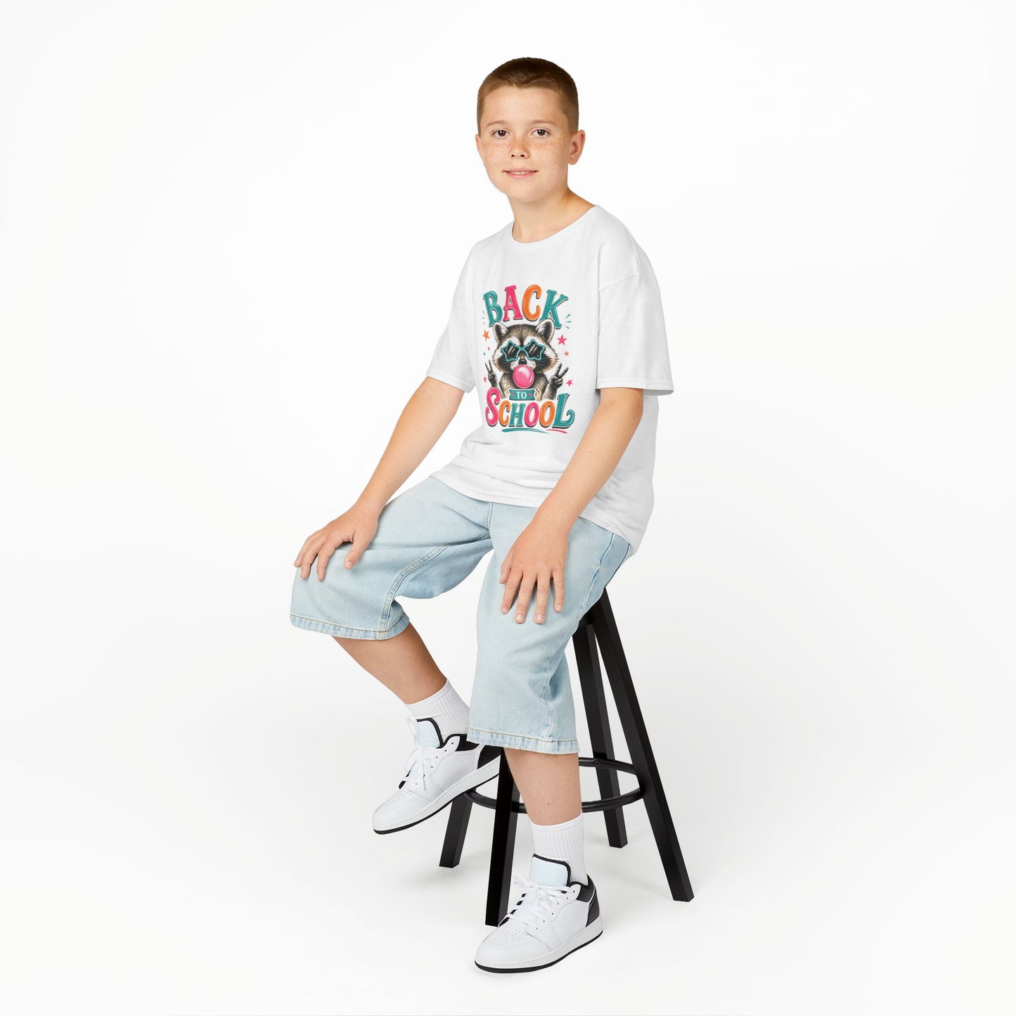 Kids white crewneck T-shirt worn with “Back to School” raccoon graphic