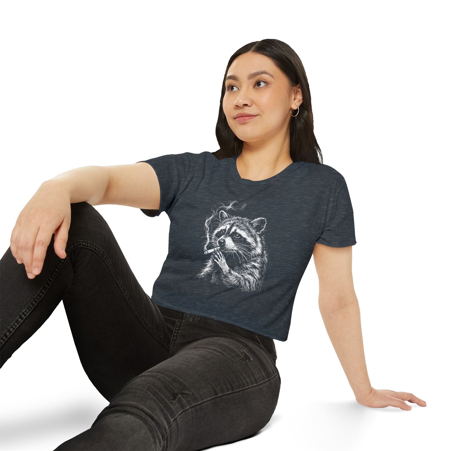 Dark gray short-sleeve crop top with white raccoon graphic worn by model