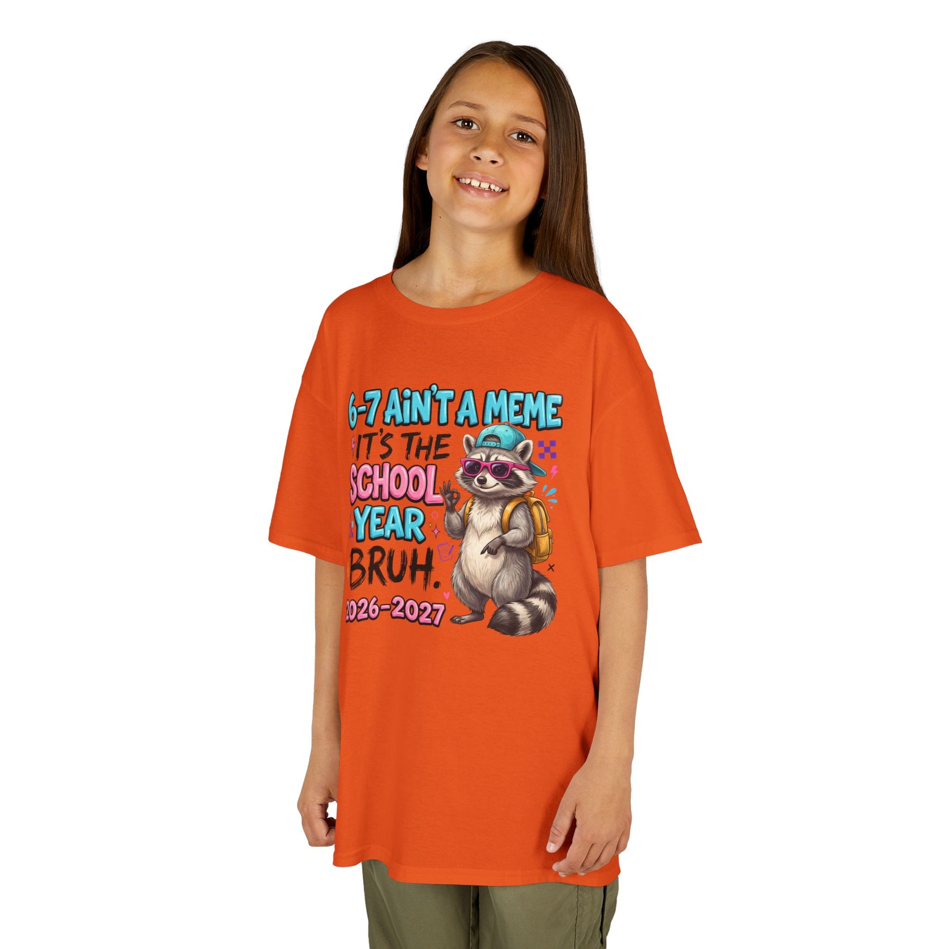 Orange kids graphic T-shirt with raccoon backpack meme print, worn by child