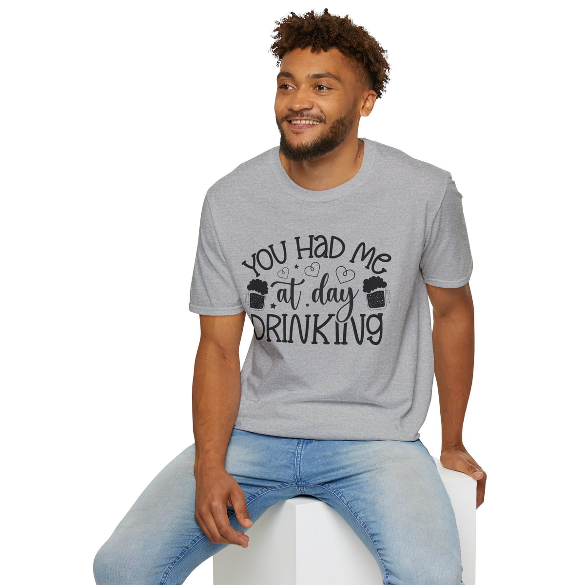 Sport grey T-shirt on seated model, “You Had Me at Day Drinking” graphic centered
