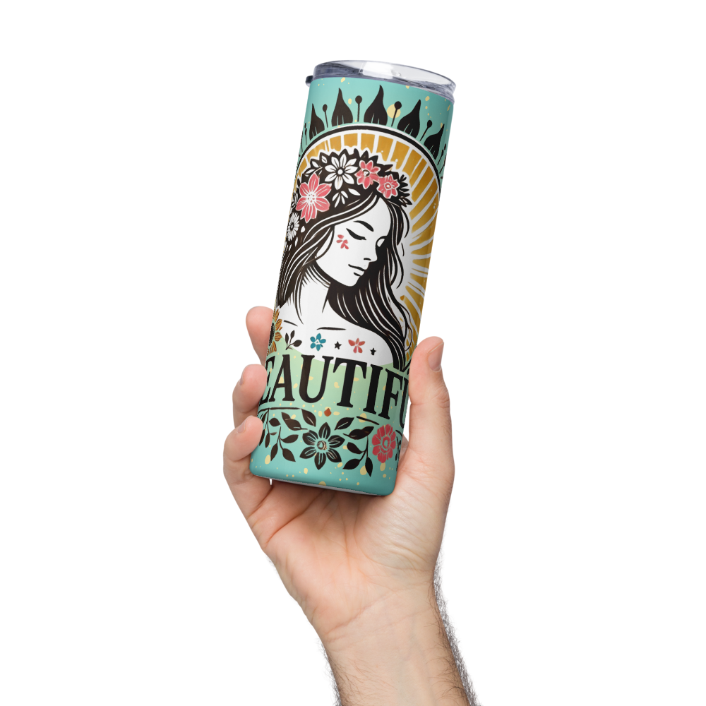 Teal statement tumbler with woman face floral graphic, held in hand