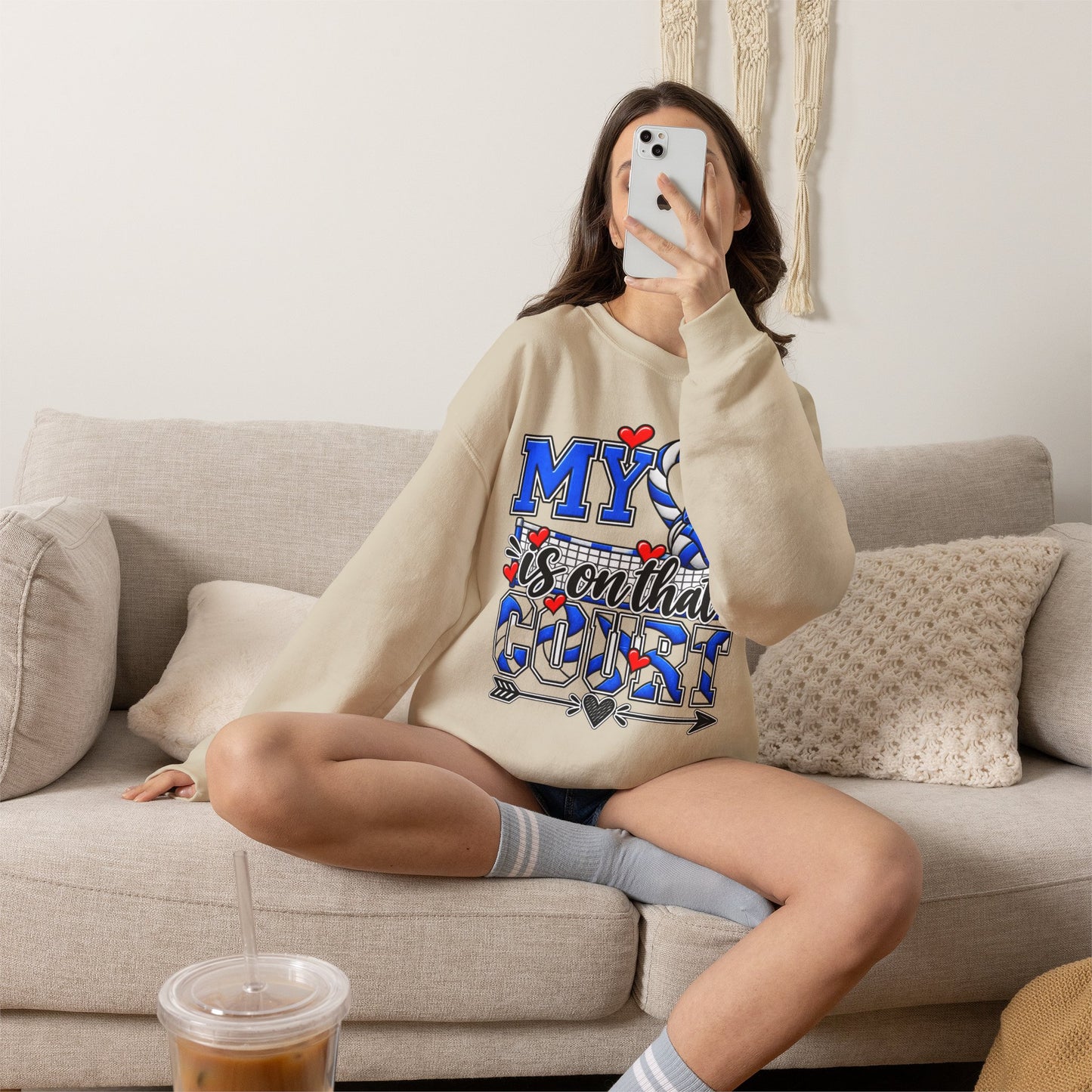 Light sand crewneck sweatshirt with blue volleyball and heart “court” style graphic