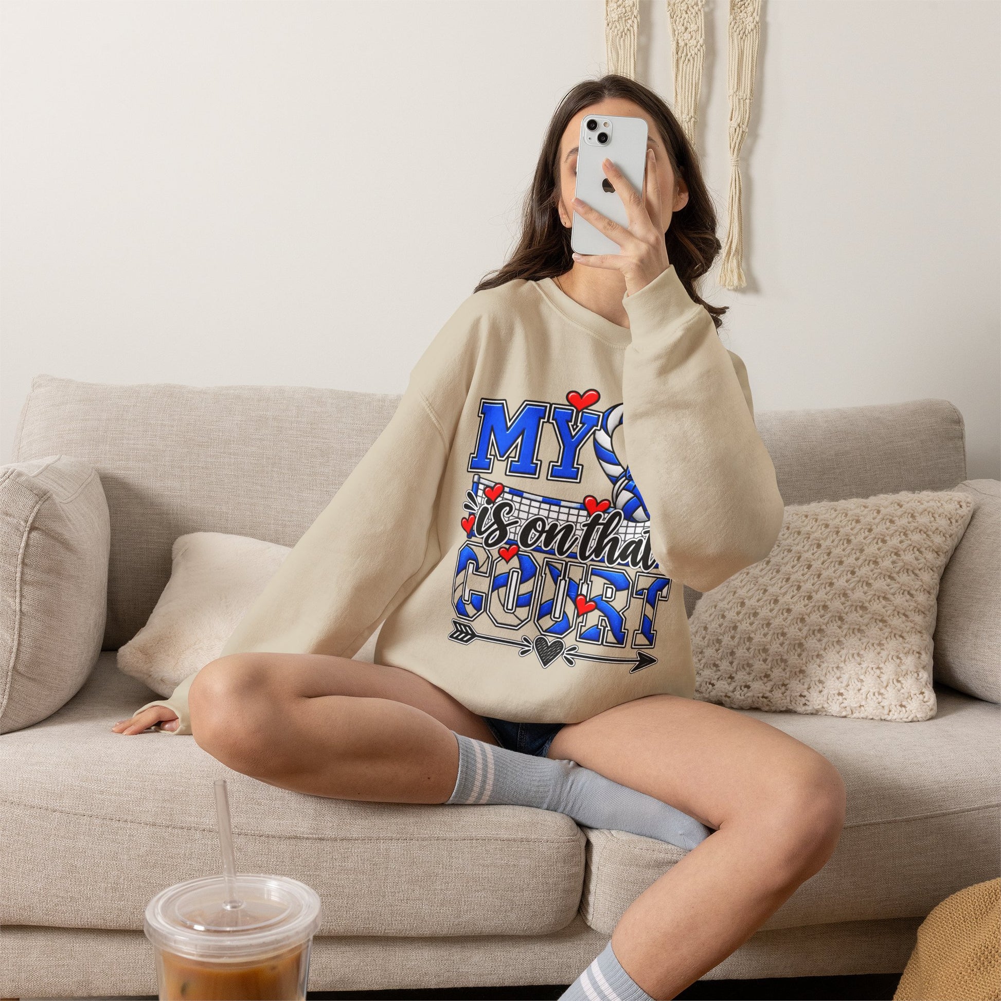 Light sand crewneck sweatshirt with blue volleyball and heart “court” style graphic