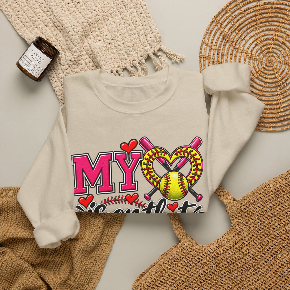Cream-toned sweatshirt close-up of front “My Heart” softball graphic and hearts