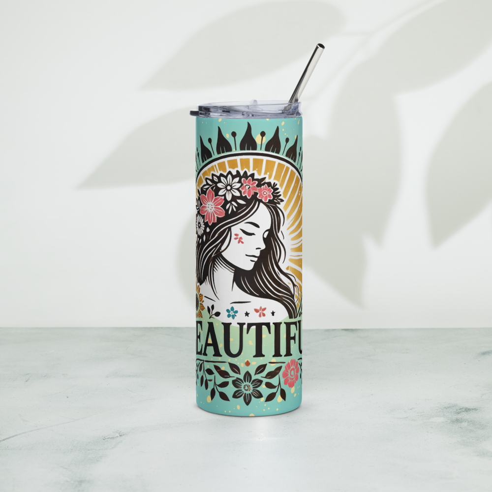 Teal statement tumbler front view with woman face floral art, clear lid and straw