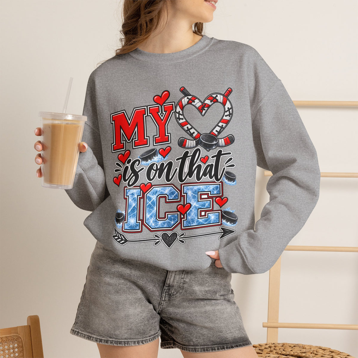 Heather gray crewneck sweatshirt with 'MY is on that ICE' heart skate design