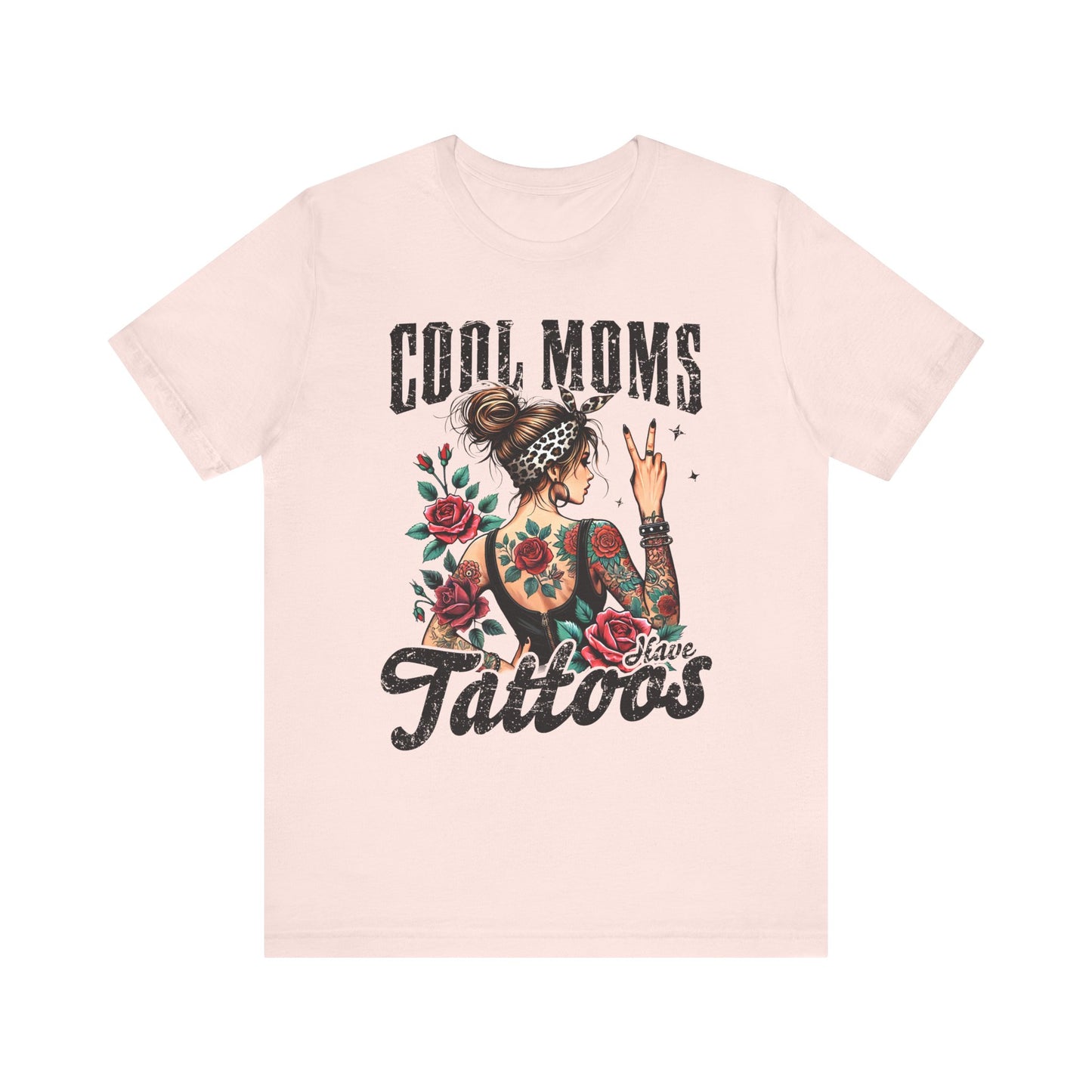 Light pink unisex short sleeve jersey tee with front “Cool Moms Tattoos” graphic