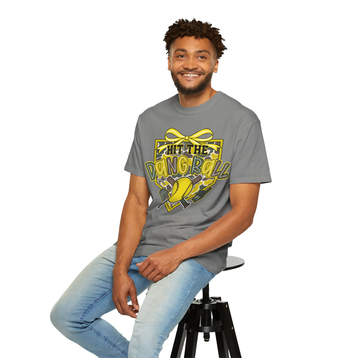 Gray crewneck softball graphic tee with yellow bow “Hit The Dang Ball” design