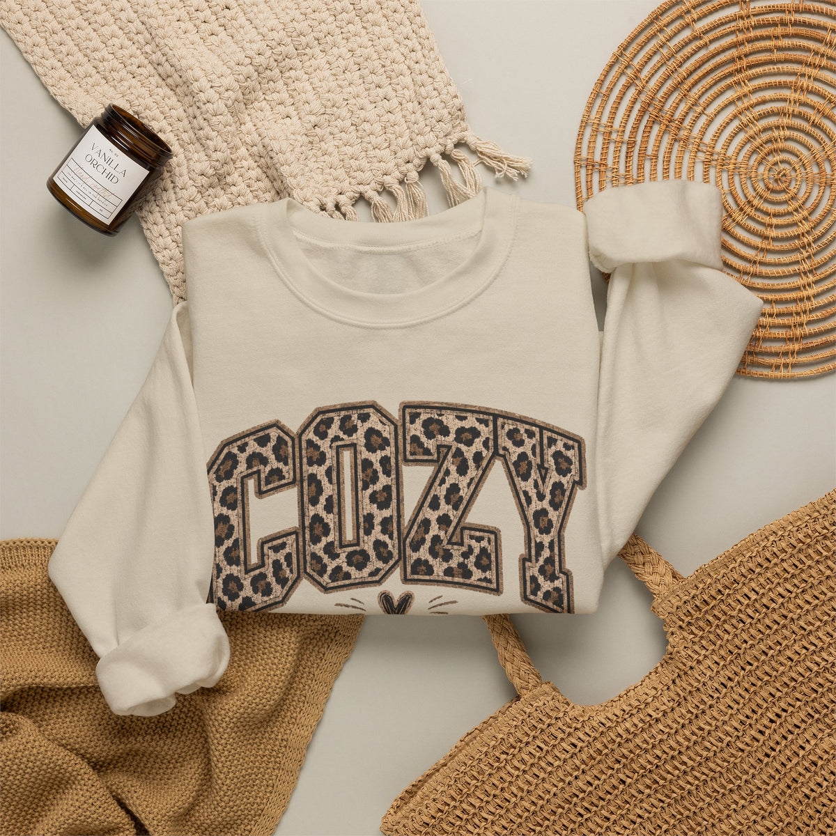Off-white leopard graphic crewneck sweatshirt with long sleeves and ribbed cuffs