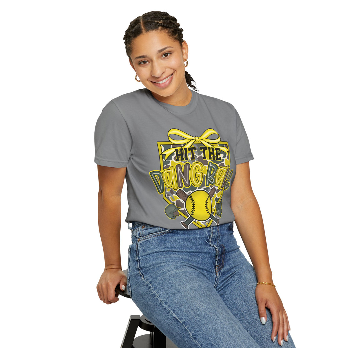 Gray crewneck softball graphic tee with yellow bow “Hit The Dang Ball” design