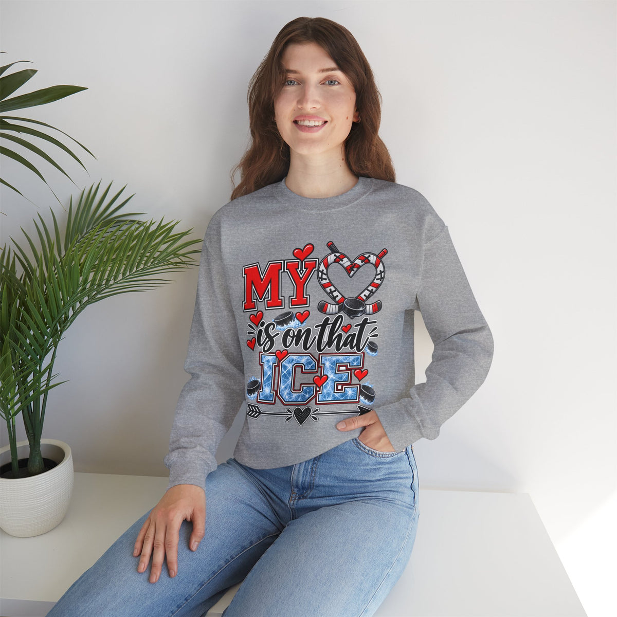 Heather gray sweatshirt on model, featuring 'MY is on that ICE' heart skate graphic