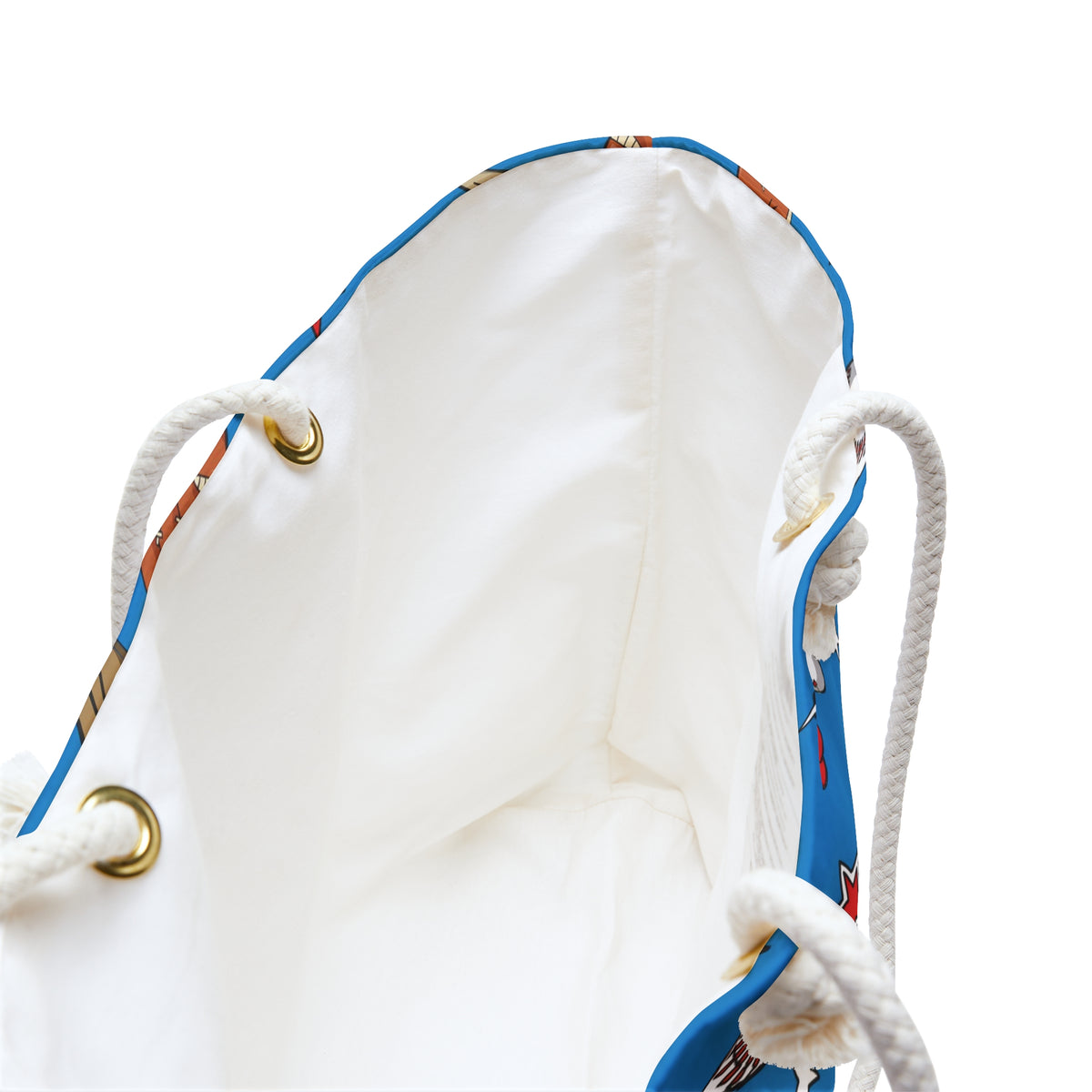 White interior lining with blue edge of rope-handle tote bag, baseball pattern trim