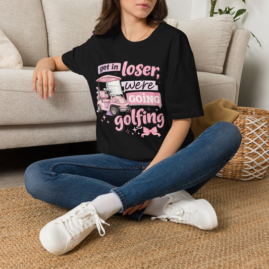 Black golfing graphic T-shirt with pink text and cart illustration on chest