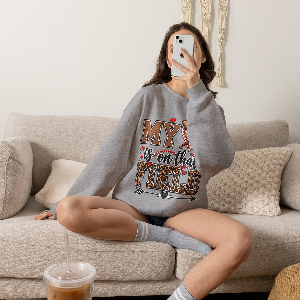 Sport grey crewneck sweatshirt with front graphic and long sleeves, relaxed fit