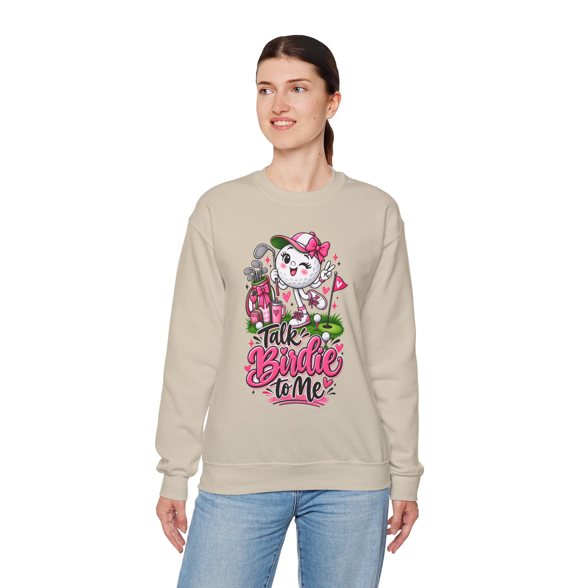 Light tan crewneck sweatshirt with colorful golf-ball character graphic on front