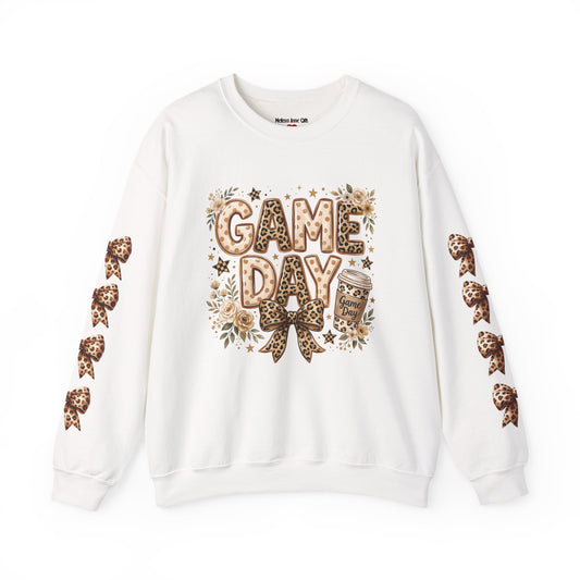 White crewneck sweatshirt with leopard bow sleeves and “GAME DAY” front graphic
