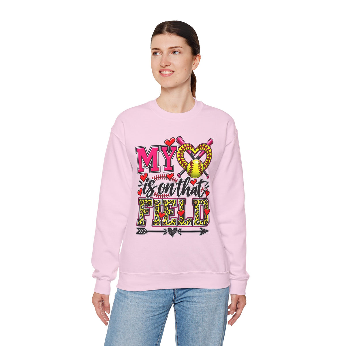 Light pink crewneck sweatshirt with colorful softball heart design on front