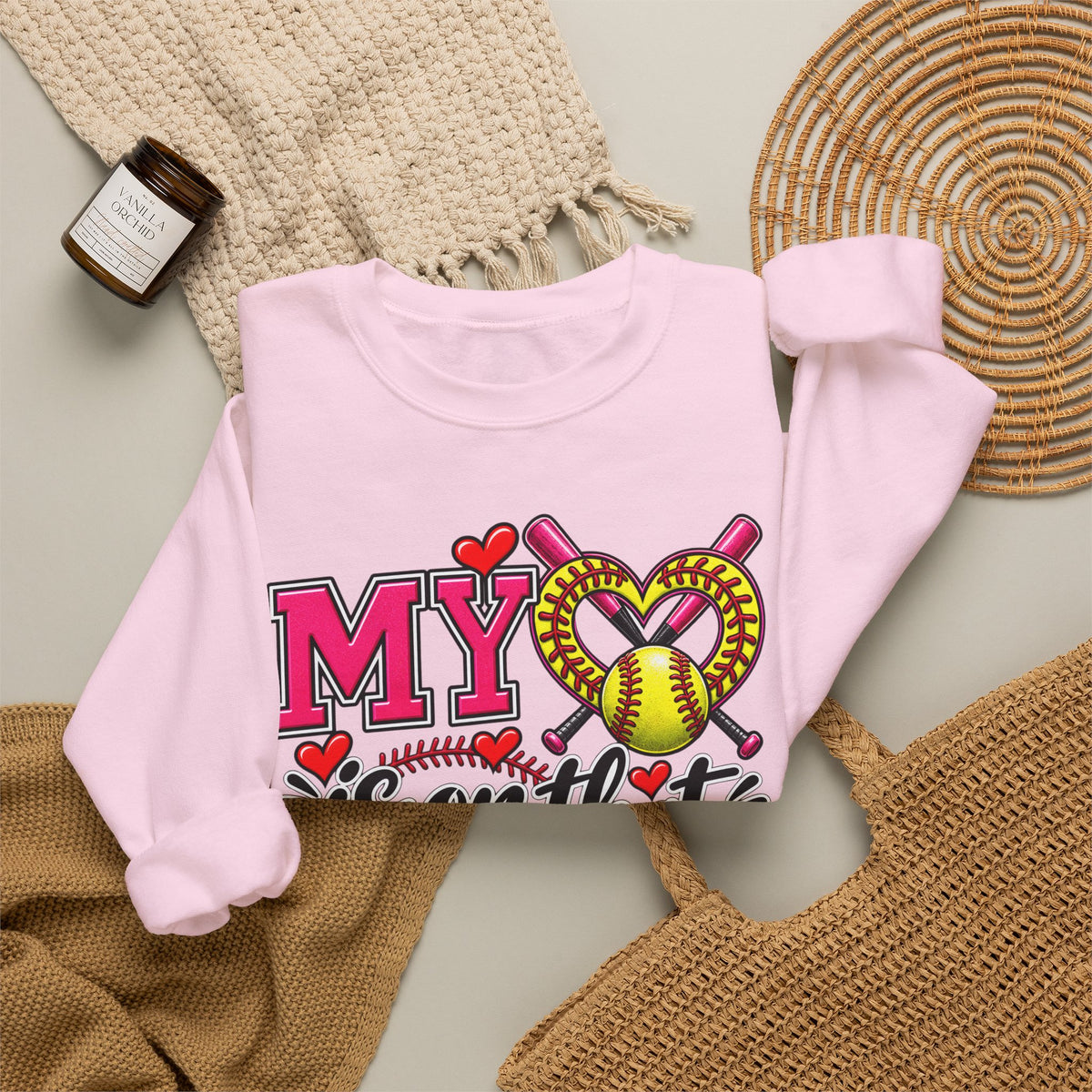 Light pink crewneck sweatshirt with colorful softball heart graphic