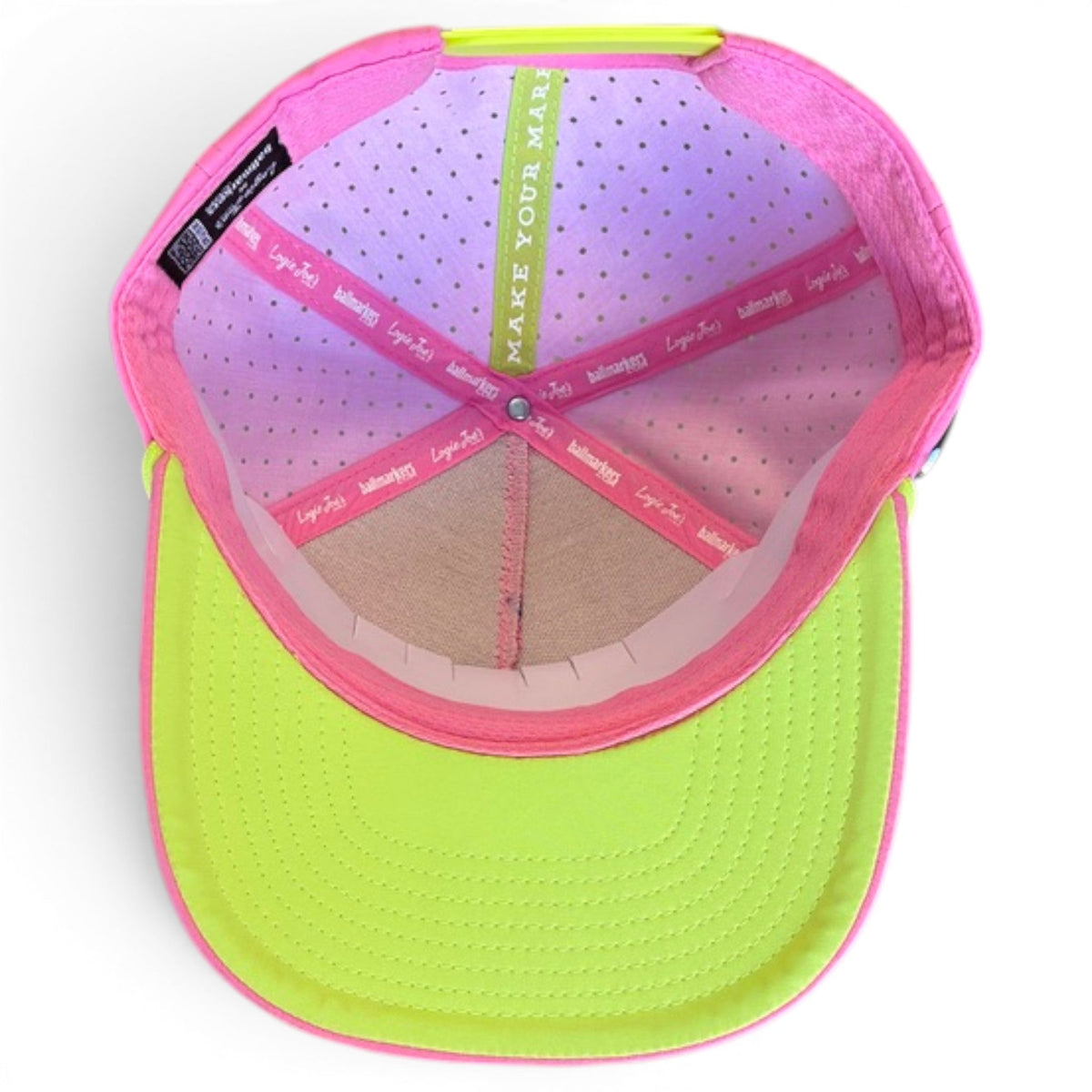 Pink and green mesh-back golf cap interior with adjustable straps