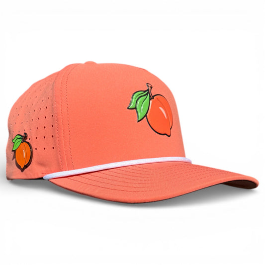 Orange snapback golf hat with fruit logo patch and white embroidered band