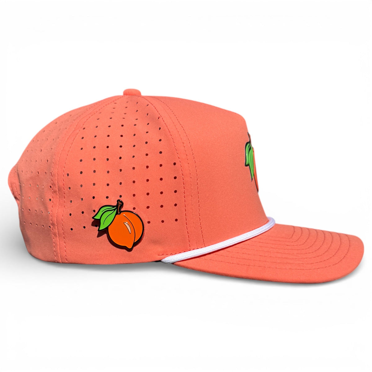 Orange snapback golf hat with perforated crown, fruit logo, and white trim band