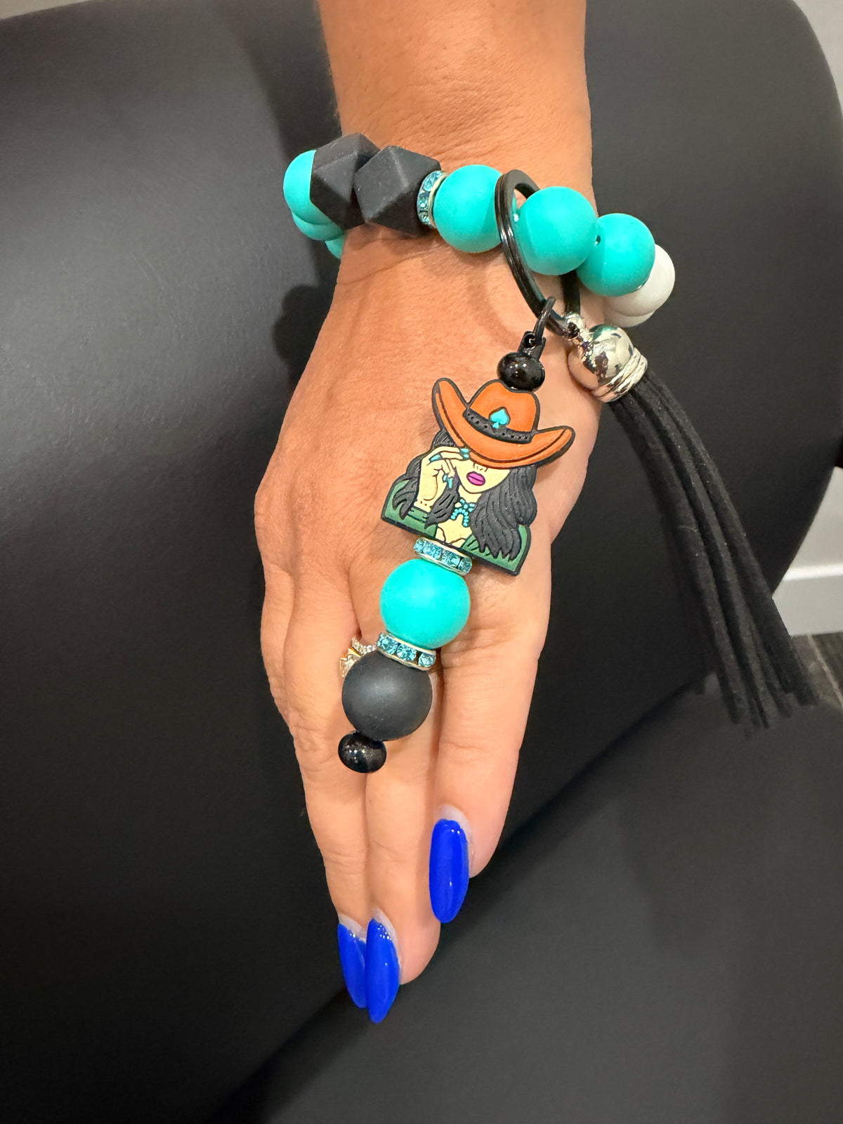Boho wristlet keychain with turquoise beads and black cords, cowgirl hat charm, keyring