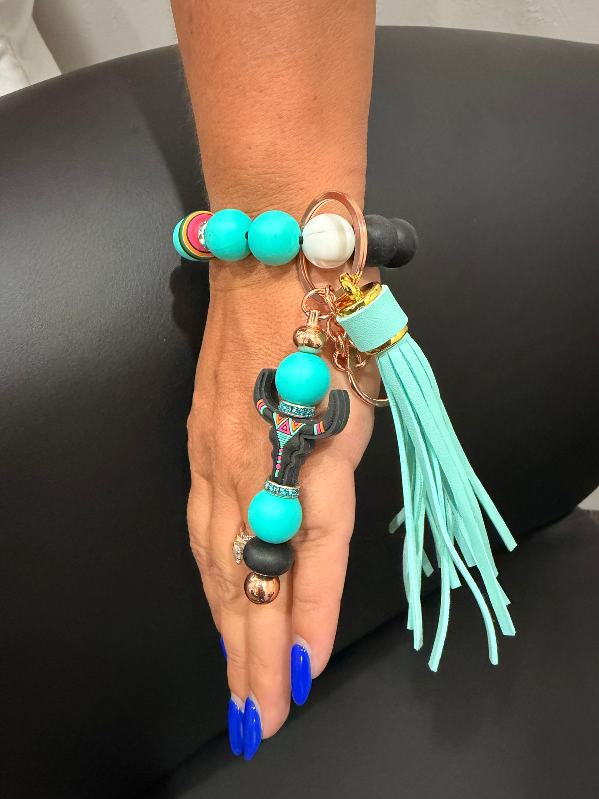 Boho wristlet keychain with turquoise beads and black accents, aqua tassel, keyring