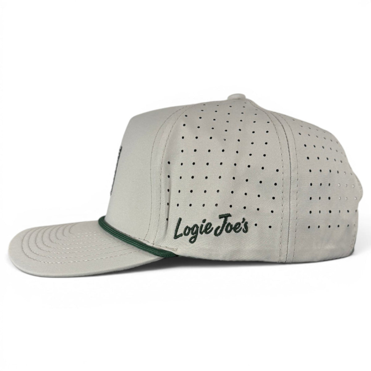 Light gray snapback golf cap with perforated crown, green brim trim, and side brand script