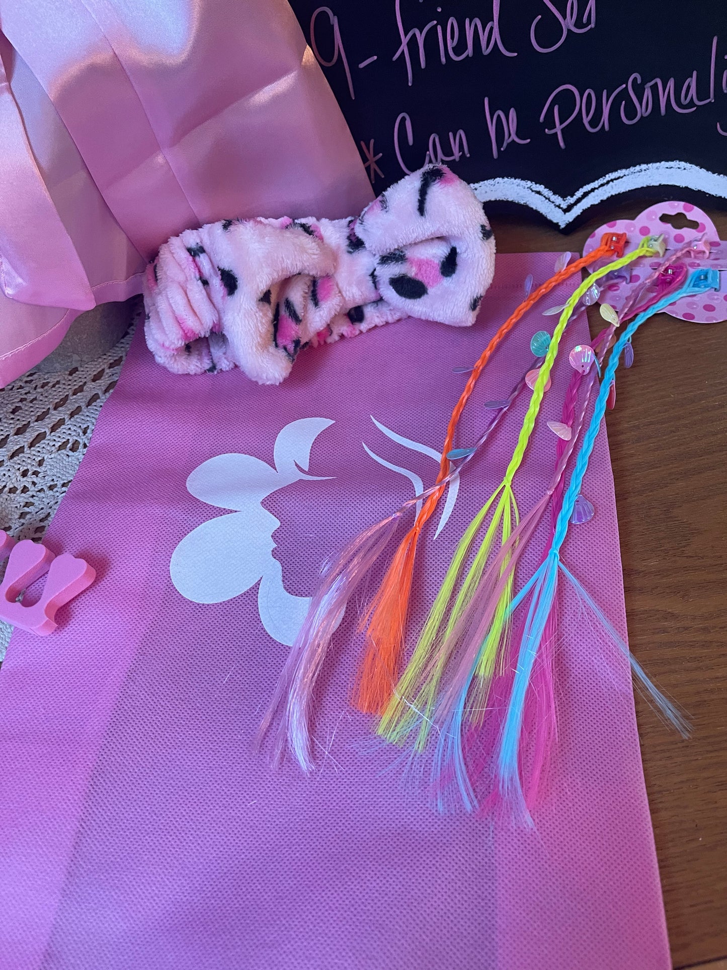 Pink satin robe with floral printed sash and plush paw slippers, colorful fringe