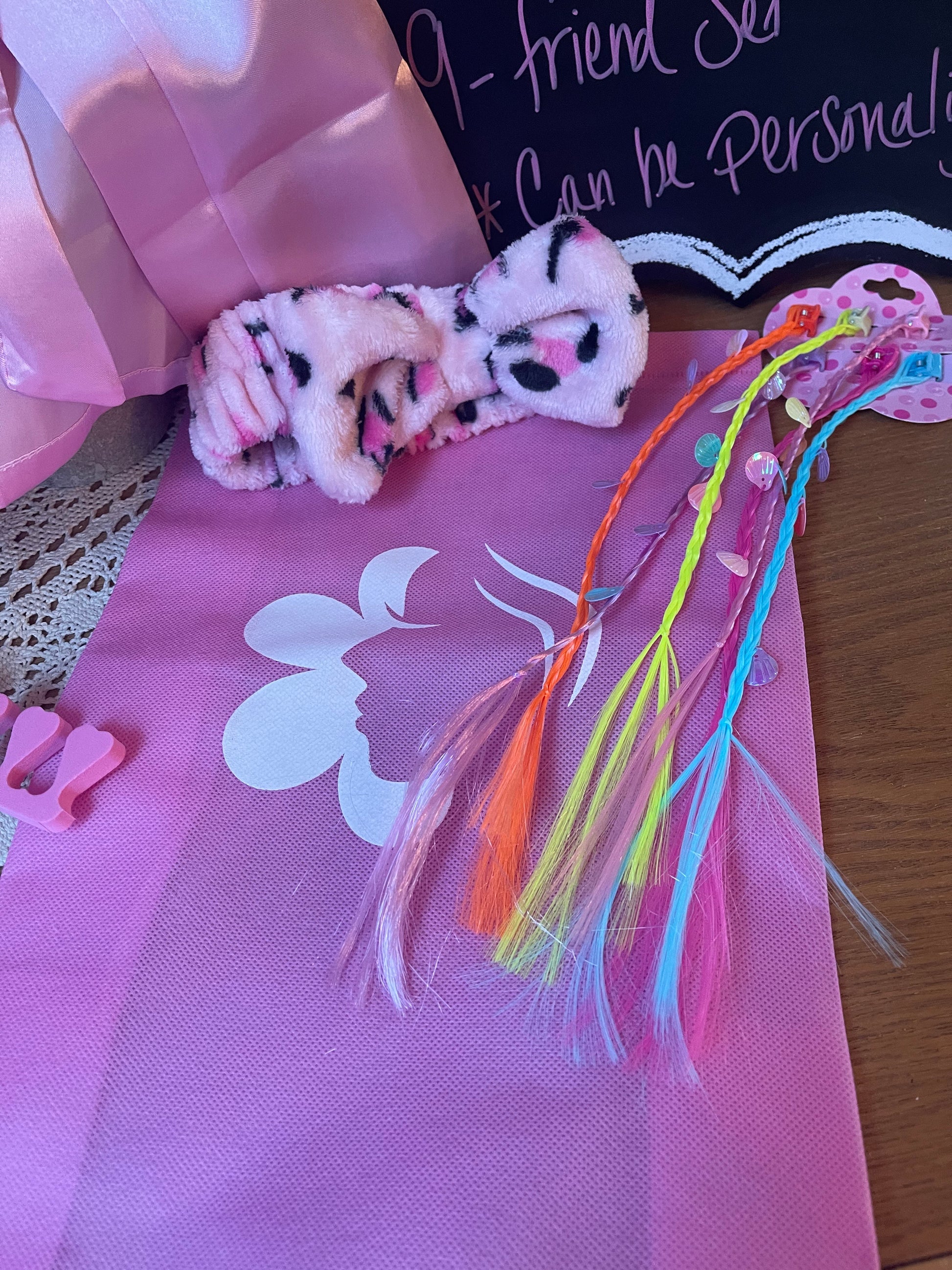 Pink satin robe with floral printed sash and plush paw slippers, colorful fringe