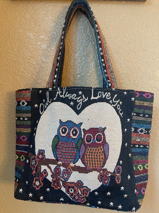 Navy canvas tote bag with owl graphic front and stitched top handles