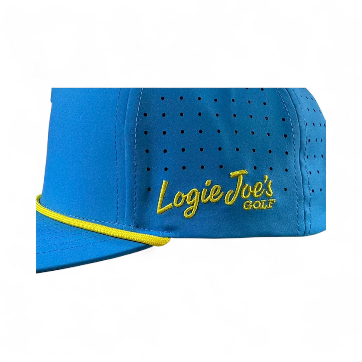Blue golf cap side panel with perforations, yellow trim, and gold Logie Joe’s logo.