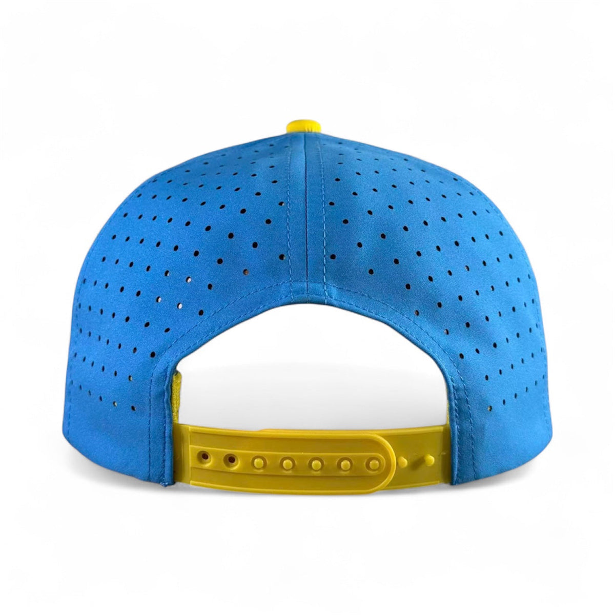Back view of blue snapback golf cap with perforations and yellow adjustable strap.