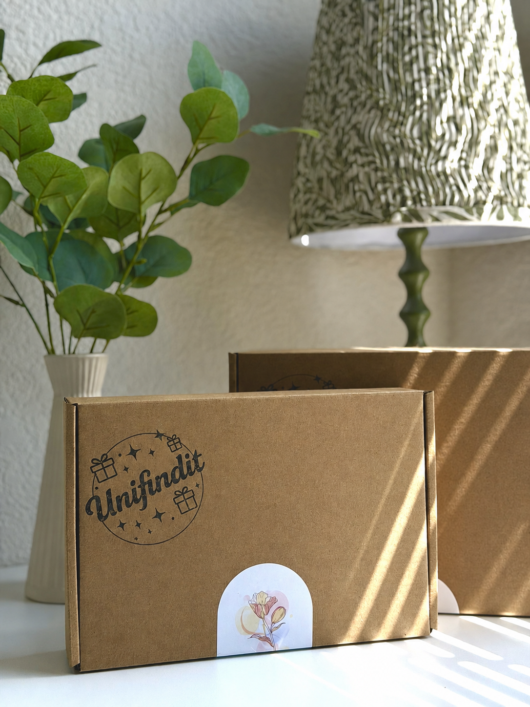 Kraft stationery gift box with InSplit logo and small round sticker by the opening