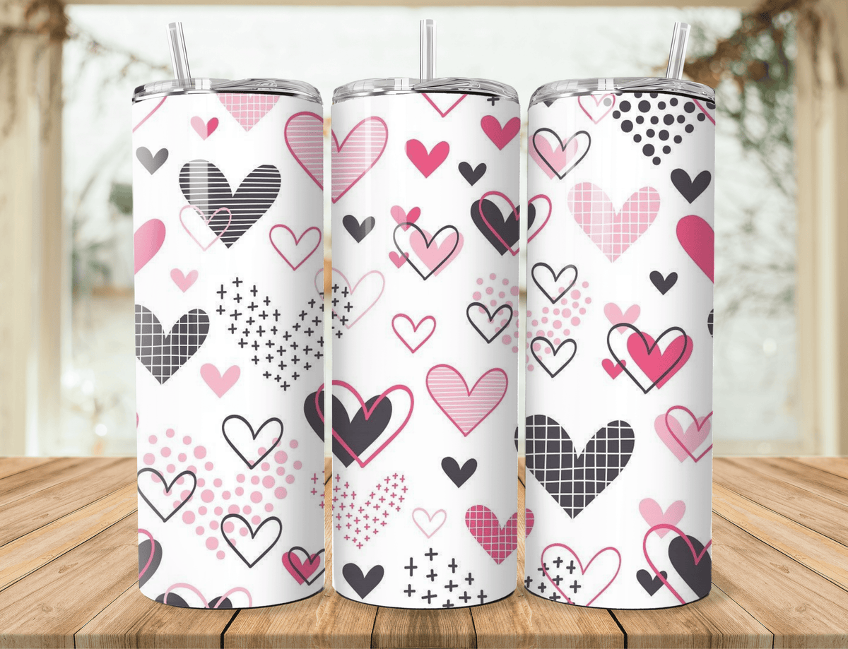 20oz stainless steel tumbler with pink and black heart pattern, clear straw