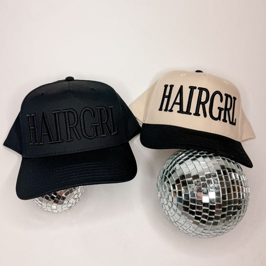 Set of HAIRGRL trucker hats: black and cream, with HAIRGRL front logos